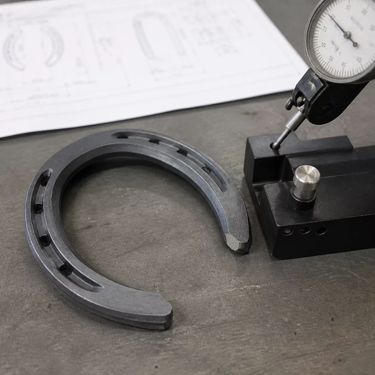 Open horseshoe specification review with gauge and fixture
