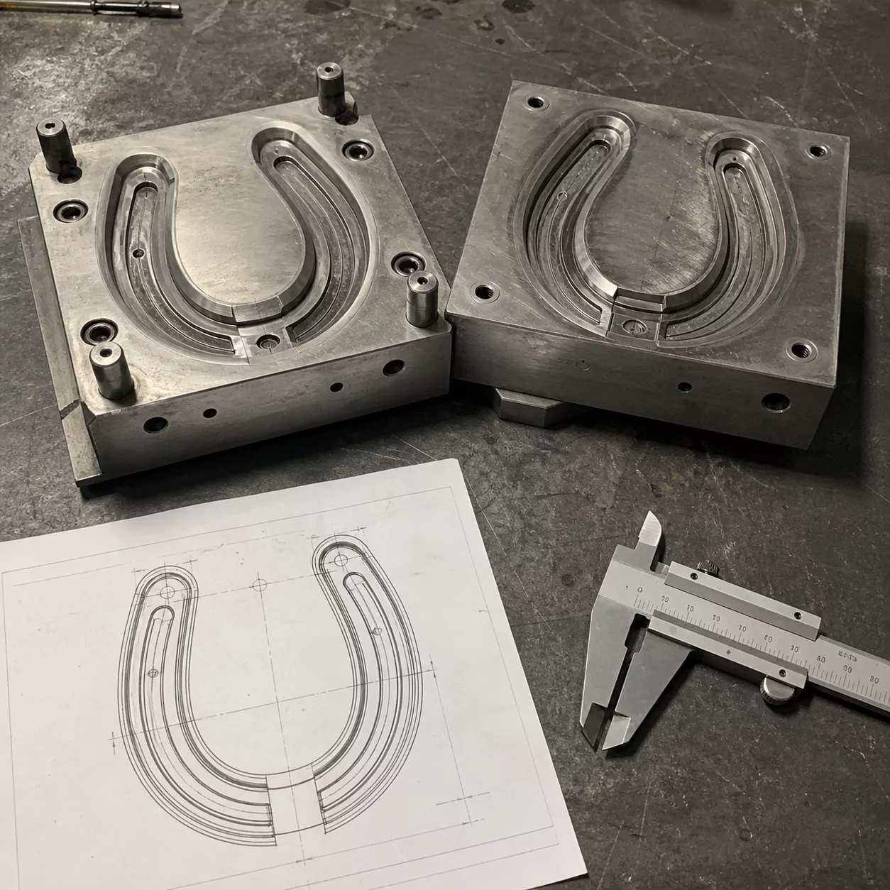 Open horseshoe mold halves and profile drawing for custom tooling