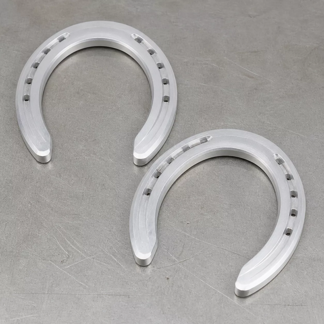 Open U-shaped aluminum horseshoe profiles