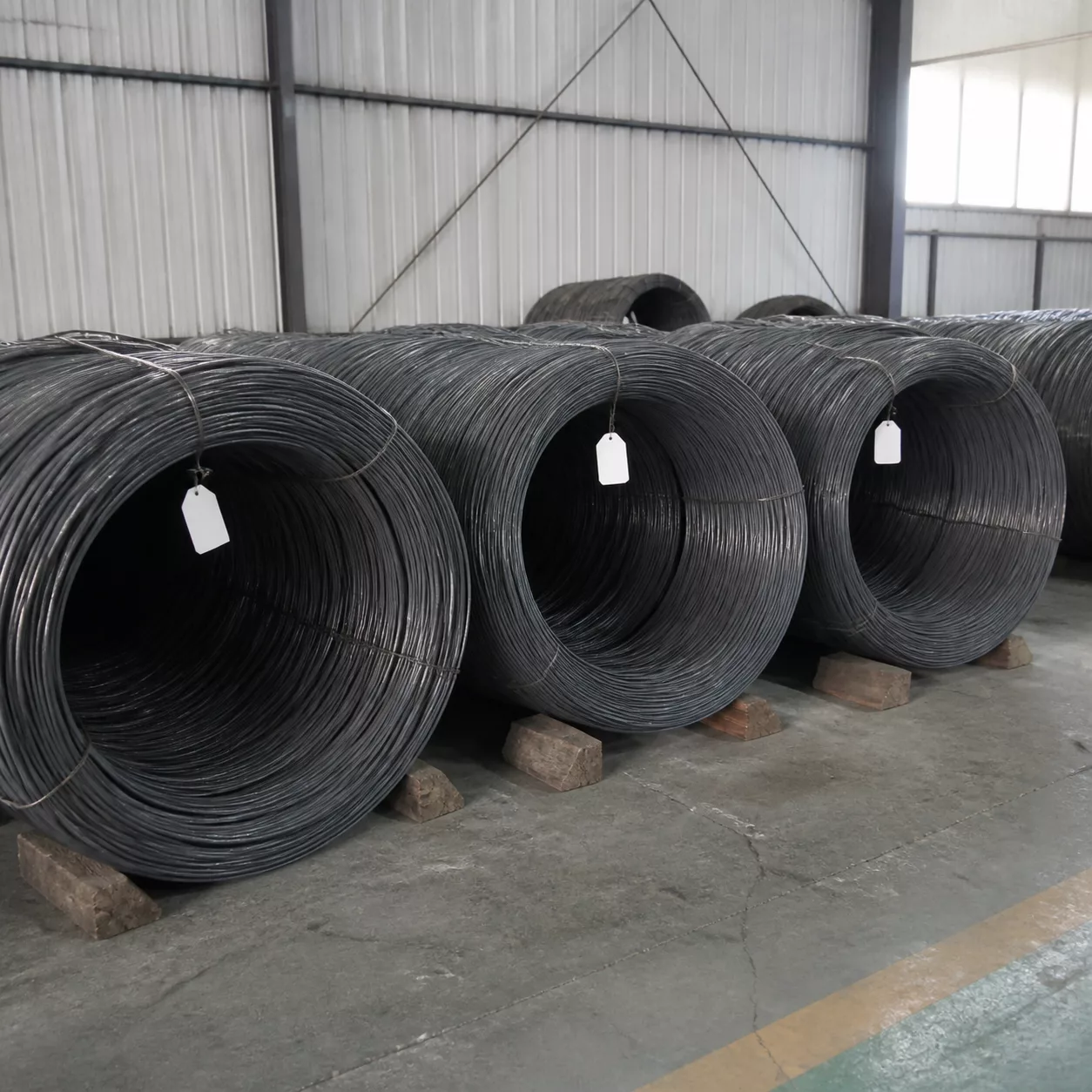 Q235 steel wire rod coils in a separate raw material area